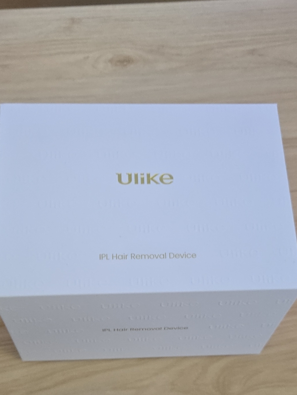 Ulike IPL Hair Removal Device - White with Gold Logo